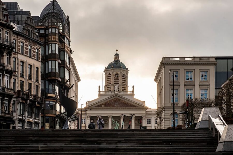 Brussels cathedral and city buildings with stairs