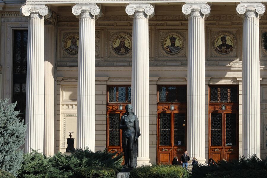 Romanian Athenaeum concert hall with classical columns and garden in Bucharest