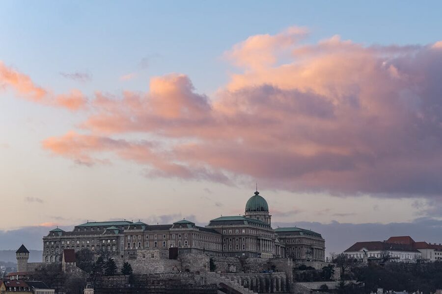 Buda Castle at sunset under dramatic clouds