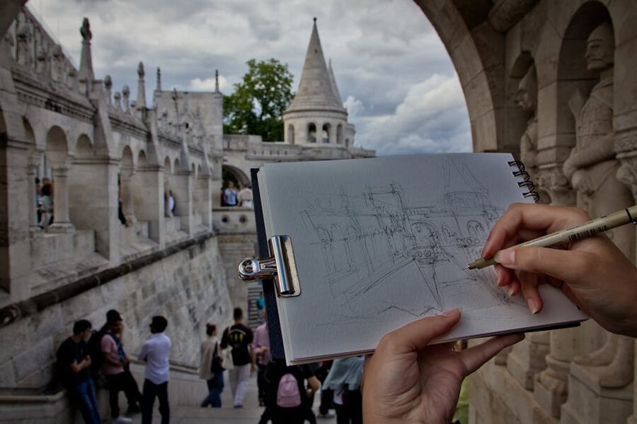Person sketching Fishermans Bastion in Budapest