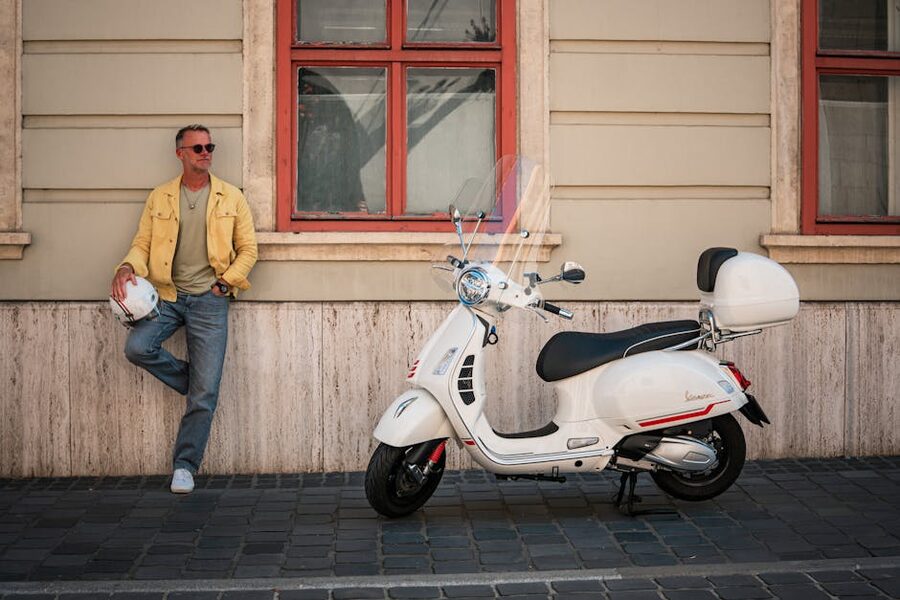 E-scooter rider in yellow jacket on a Budapest street