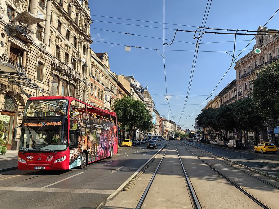 Budapest Unvi Urbis open-top sightseeing bus on a city street