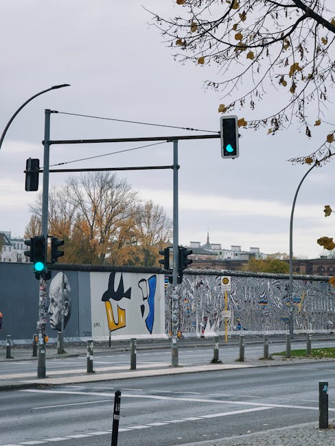 Section of Berlin Wall with historical markings