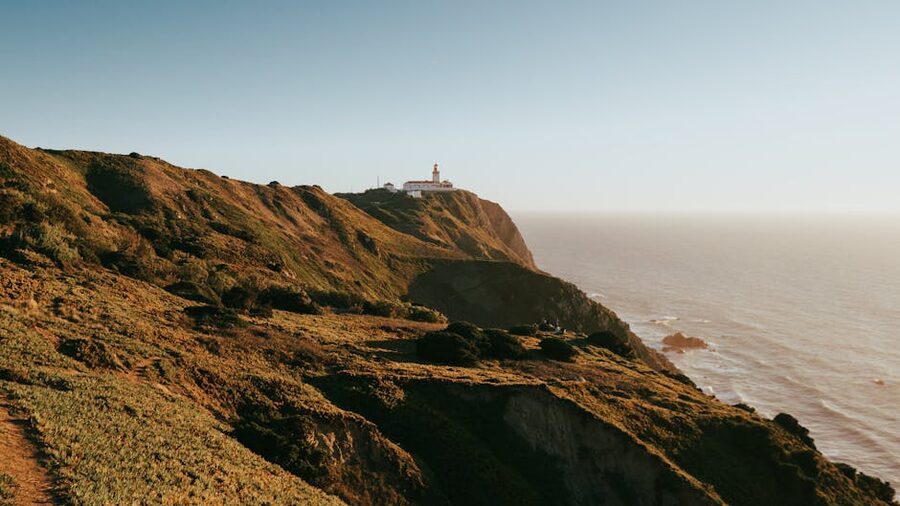 Cabo da Roca lighthouse on cliff Portugal