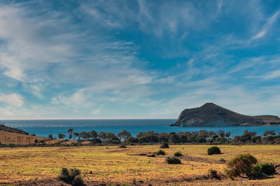 Arid mountain scenery along the Cabo de Gata coast with blue sky