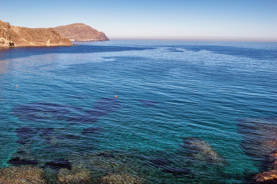 Panoramic landscape view of Cabo de Gata with blue sea and arid terrain