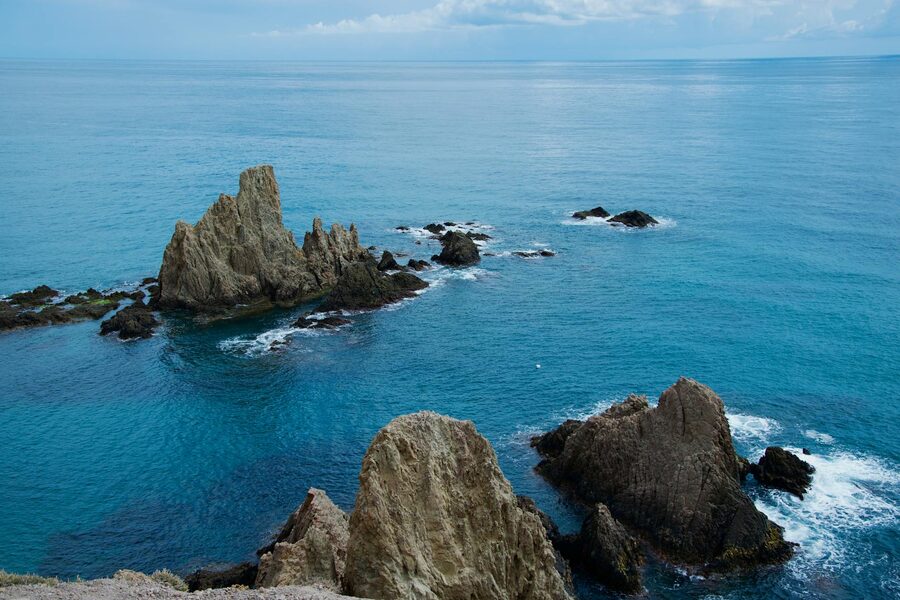 Rocky natural park coastline at Cabo de Gata with clear water