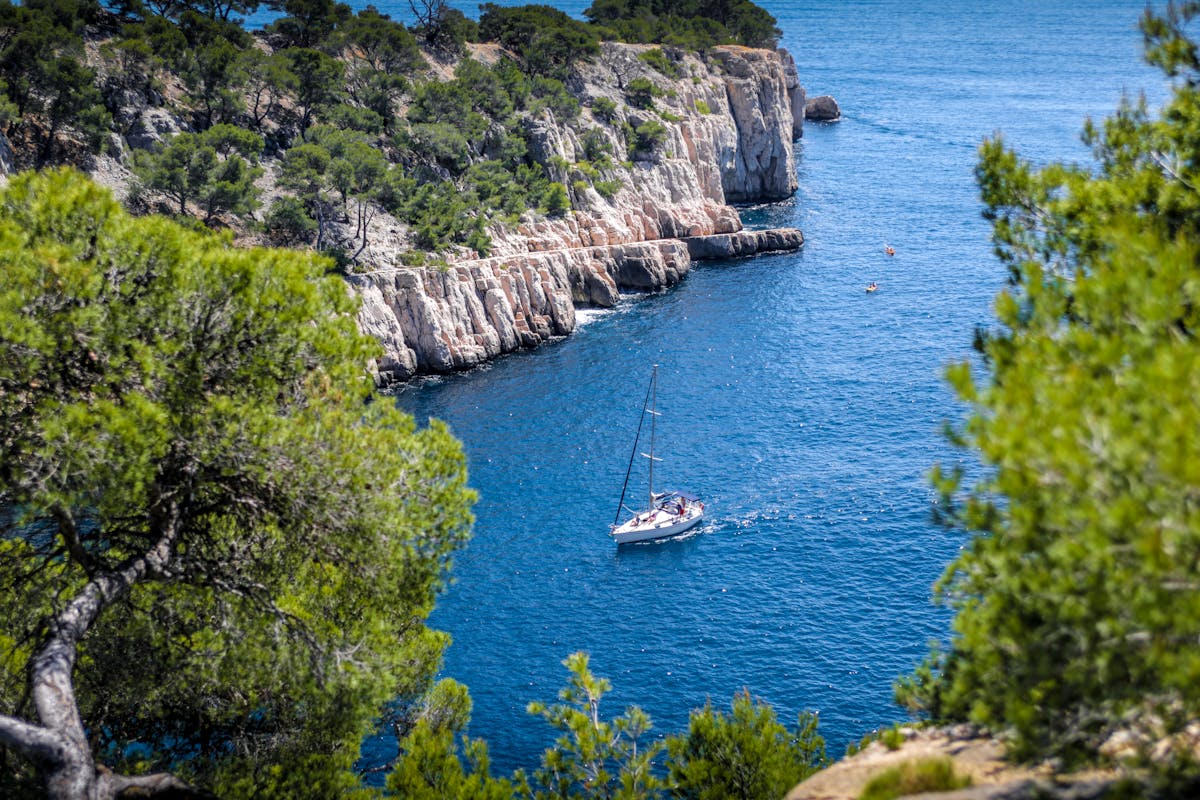 Sailboat in the blue waters of Calanques National Park near Marseille