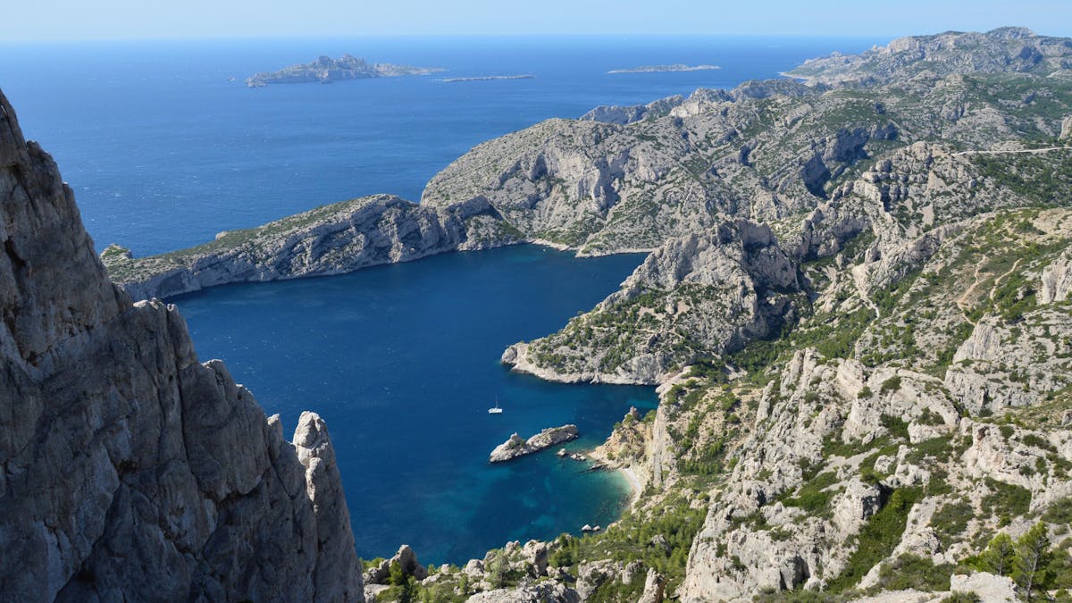 Aerial view of the Calanques limestone cliffs and turquoise Mediterranean waters near Marseille