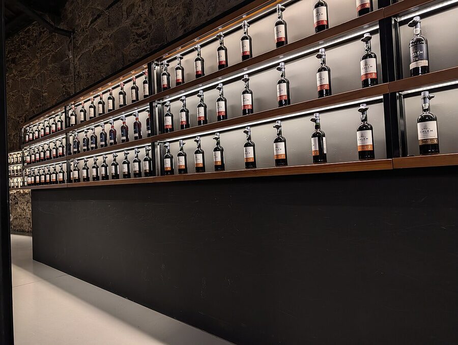 Stacked port wine barrels in long rows at Cálem cellar