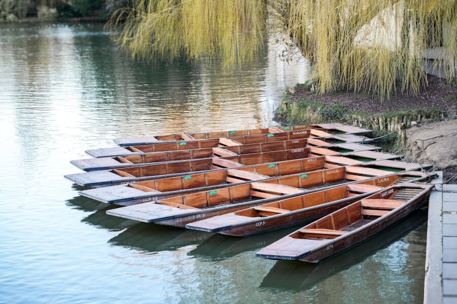 Cambridge wooden punts docked on river
