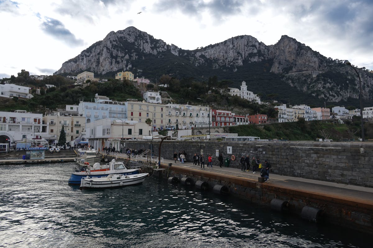 The port of Marina Grande in Capri with colorful buildings and boats in the harbor