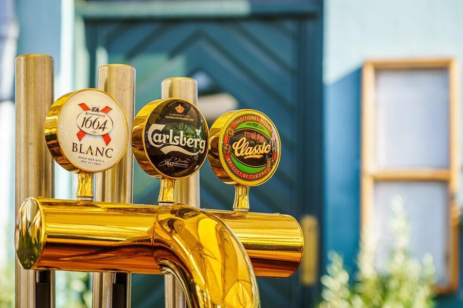 Carlsberg, Tuborg and Kronenbourg beers on tap in Copenhagen