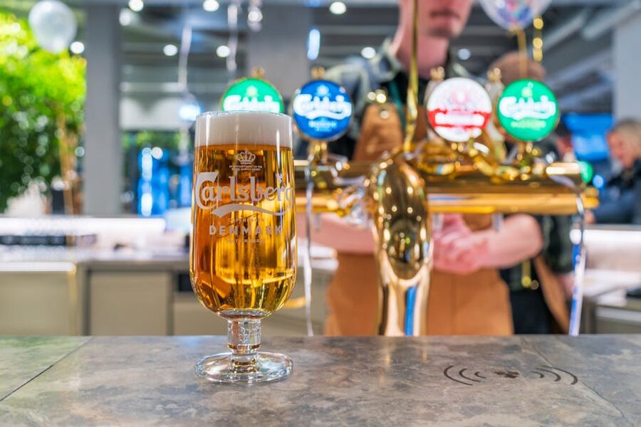 Carlsberg pilsner pour at the brewery bar in Copenhagen