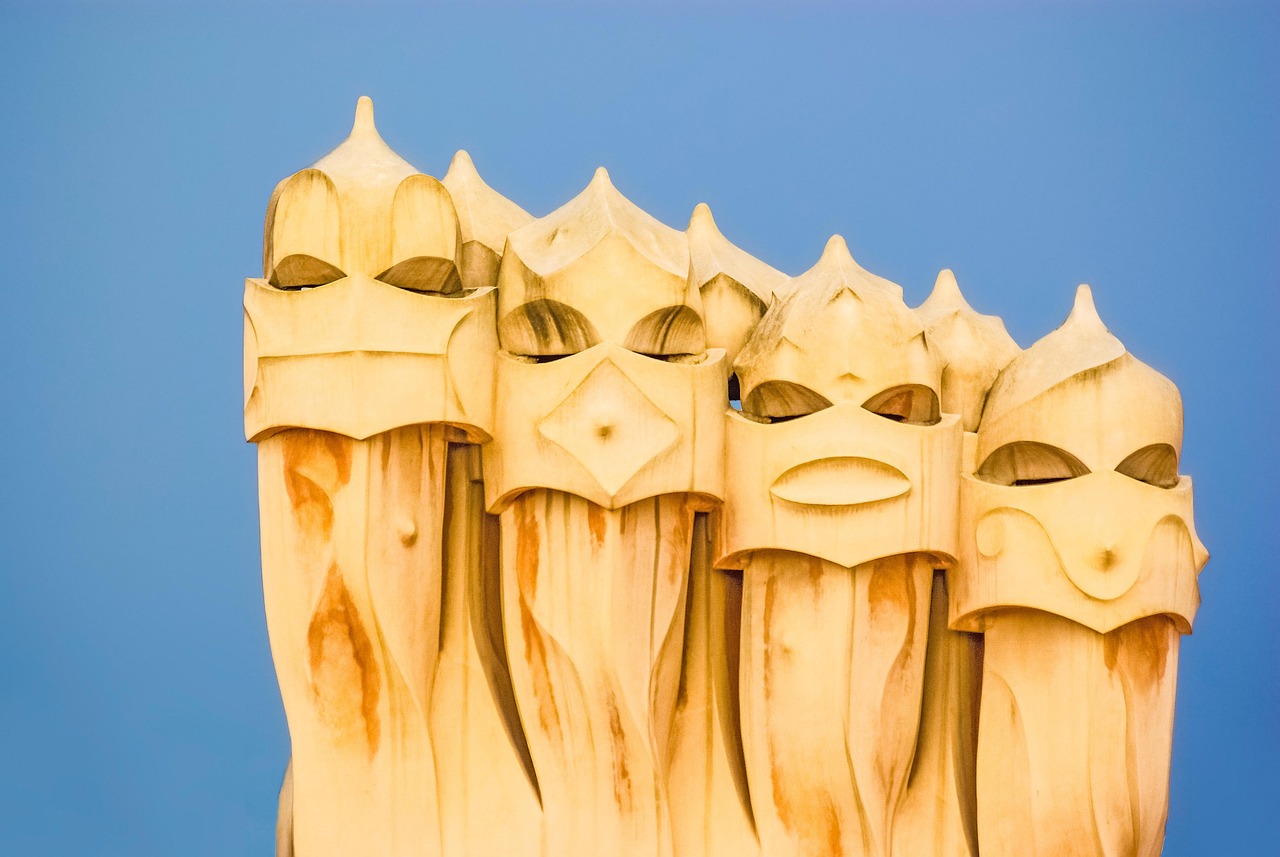 Architectural detail of Casa Mila showing the organic stone curves and iron balcony railings