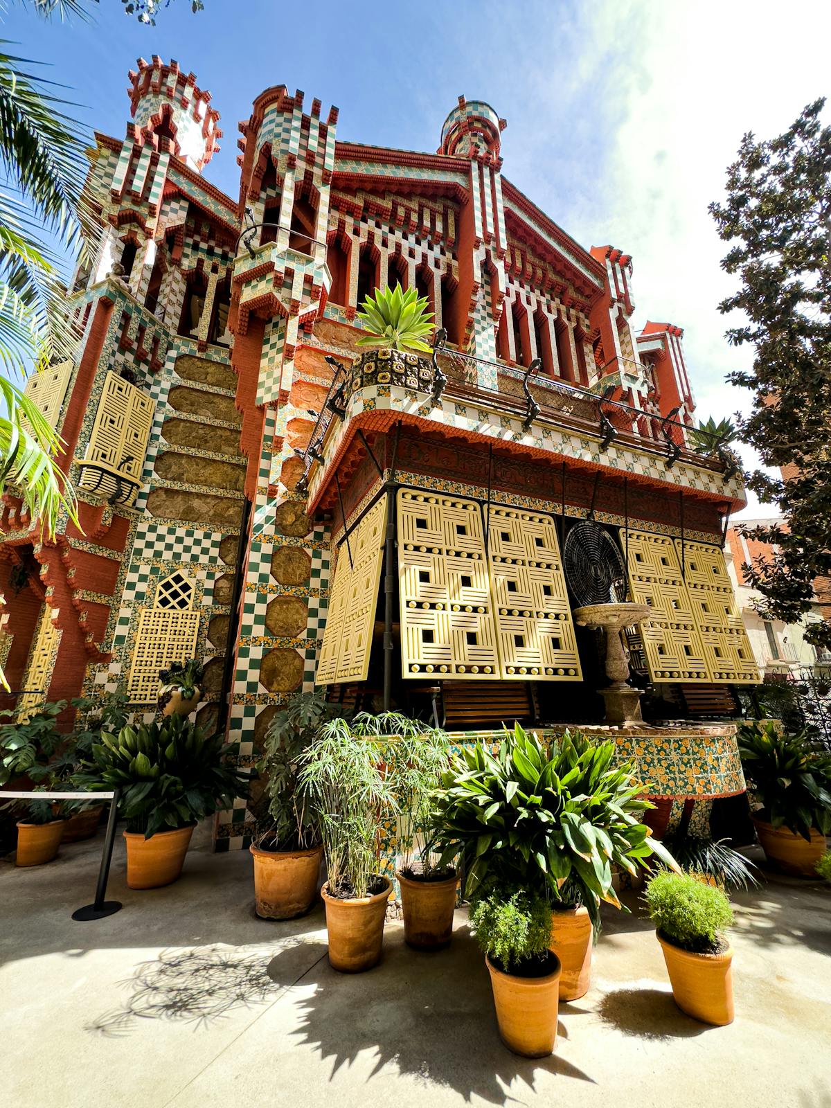 Colorful architecture of Casa Vicens showing the building exterior with marigold-inspired ceramic tiles