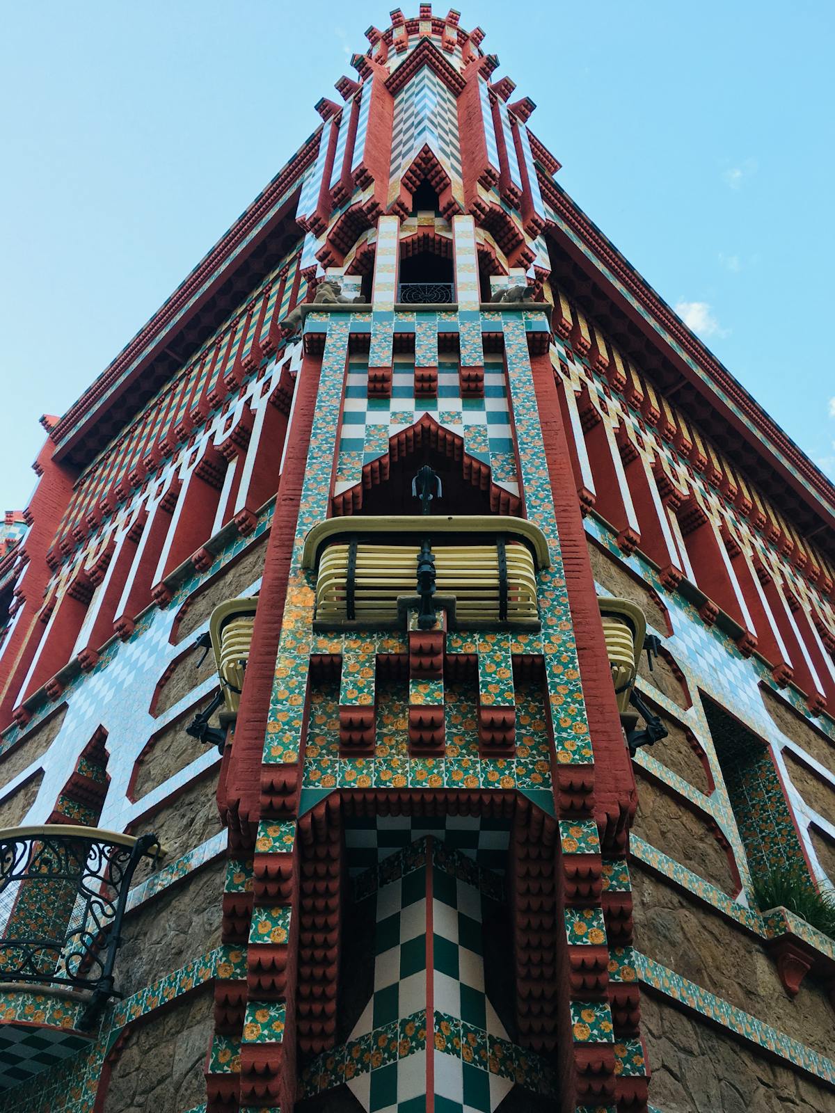 Detailed view of the green and yellow tiles on the Casa Vicens facade