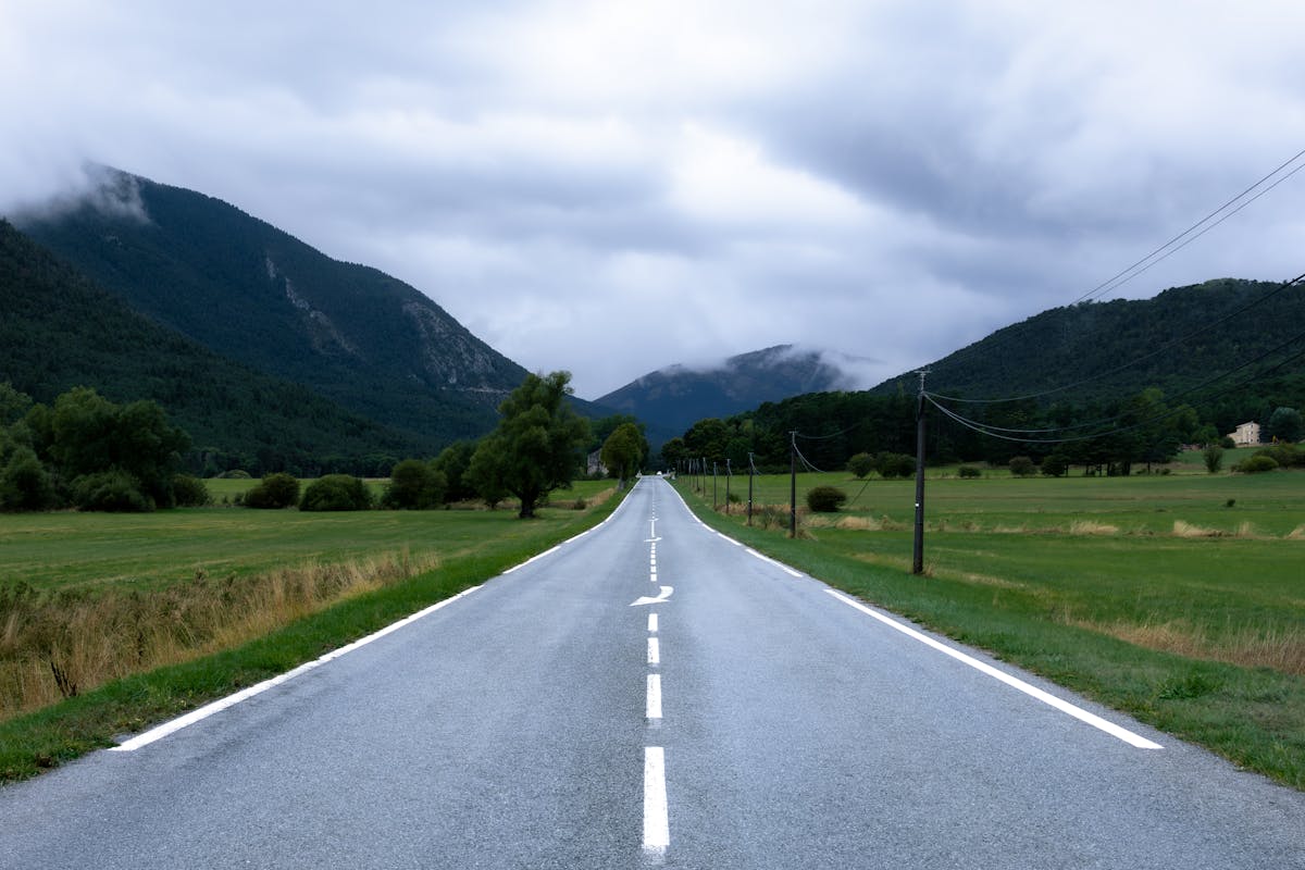 A winding mountain road leading through the hills near Castellane in Provence France