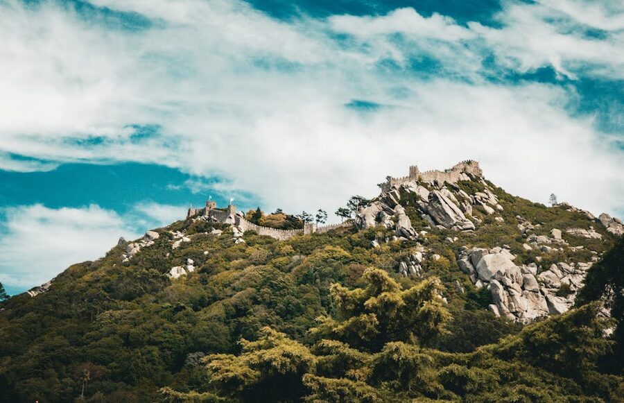 Castle of the Moors crowning a forested mountain in Sintra