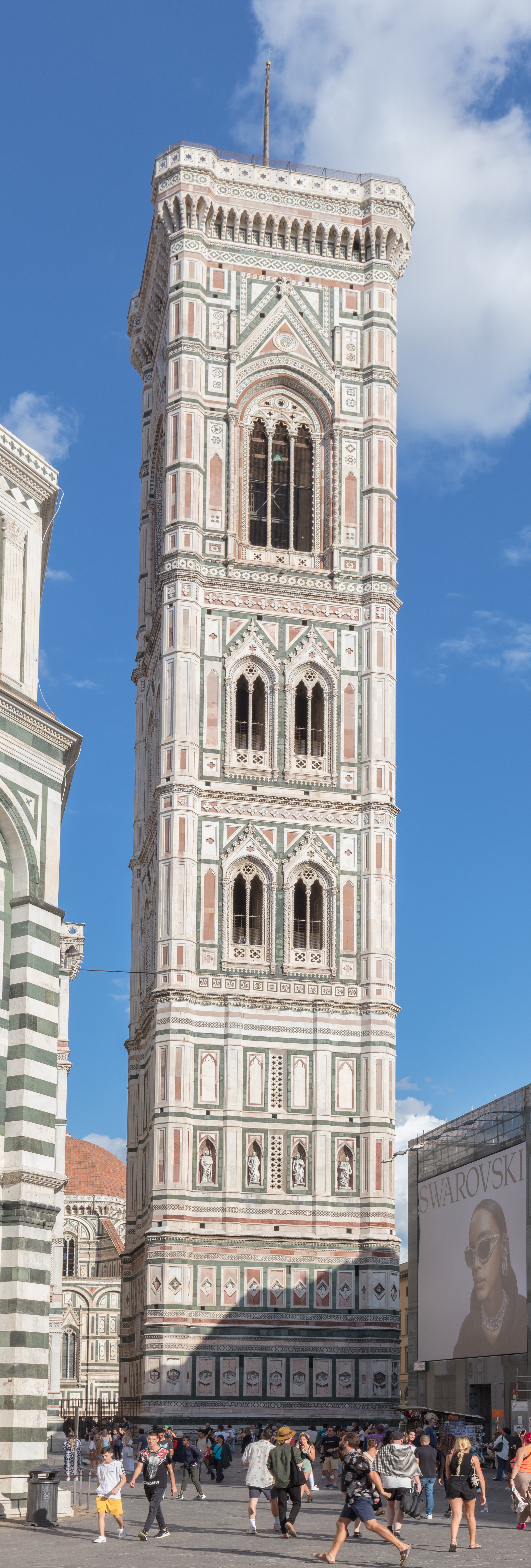Florence Cathedral and Giotto Campanile seen from the piazza showing the full scale of both structures