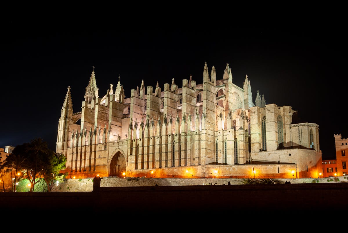 Palma Cathedral La Seu illuminated against the night sky in Mallorca Spain