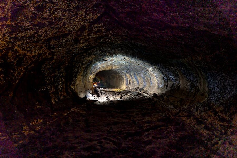 Cave tunnel with dramatic lighting and textures