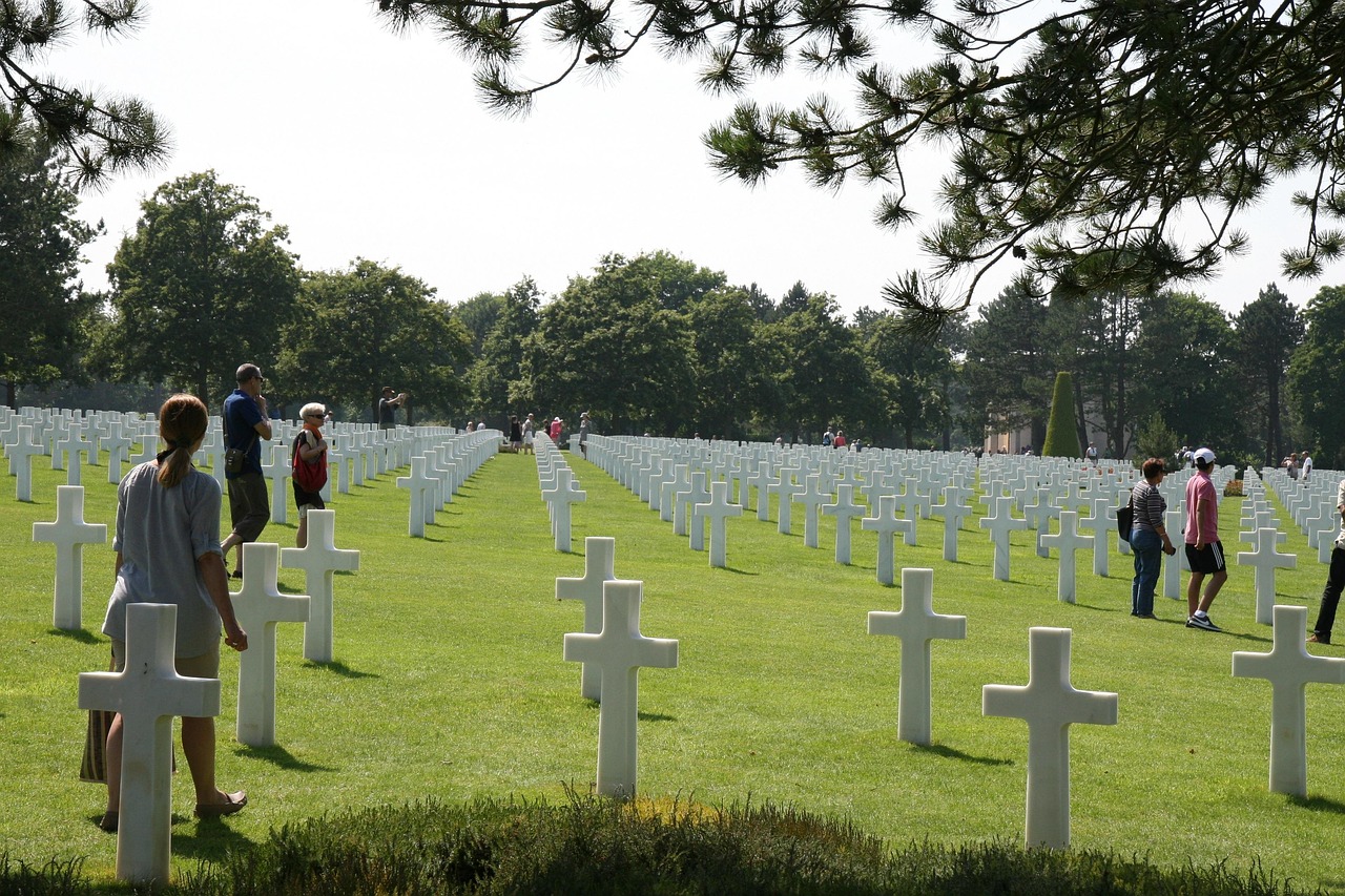 Rows of white marble crosses at the Normandy American Cemetery overlooking Omaha Beach