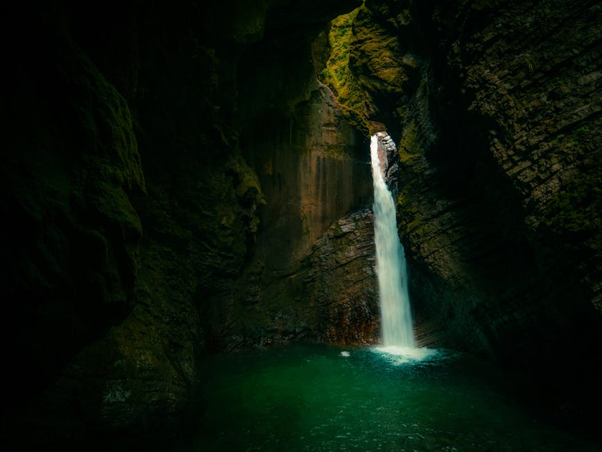 Waterfall through rocky gorge