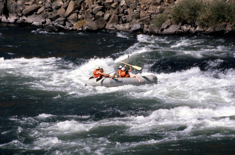 Whitewater rafting group scenic river