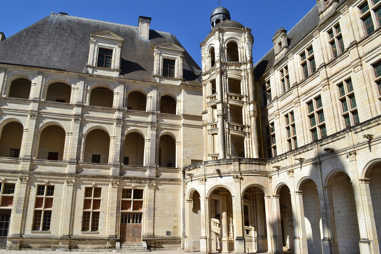 Interior arcade and spiral staircase at Chateau de Chambord