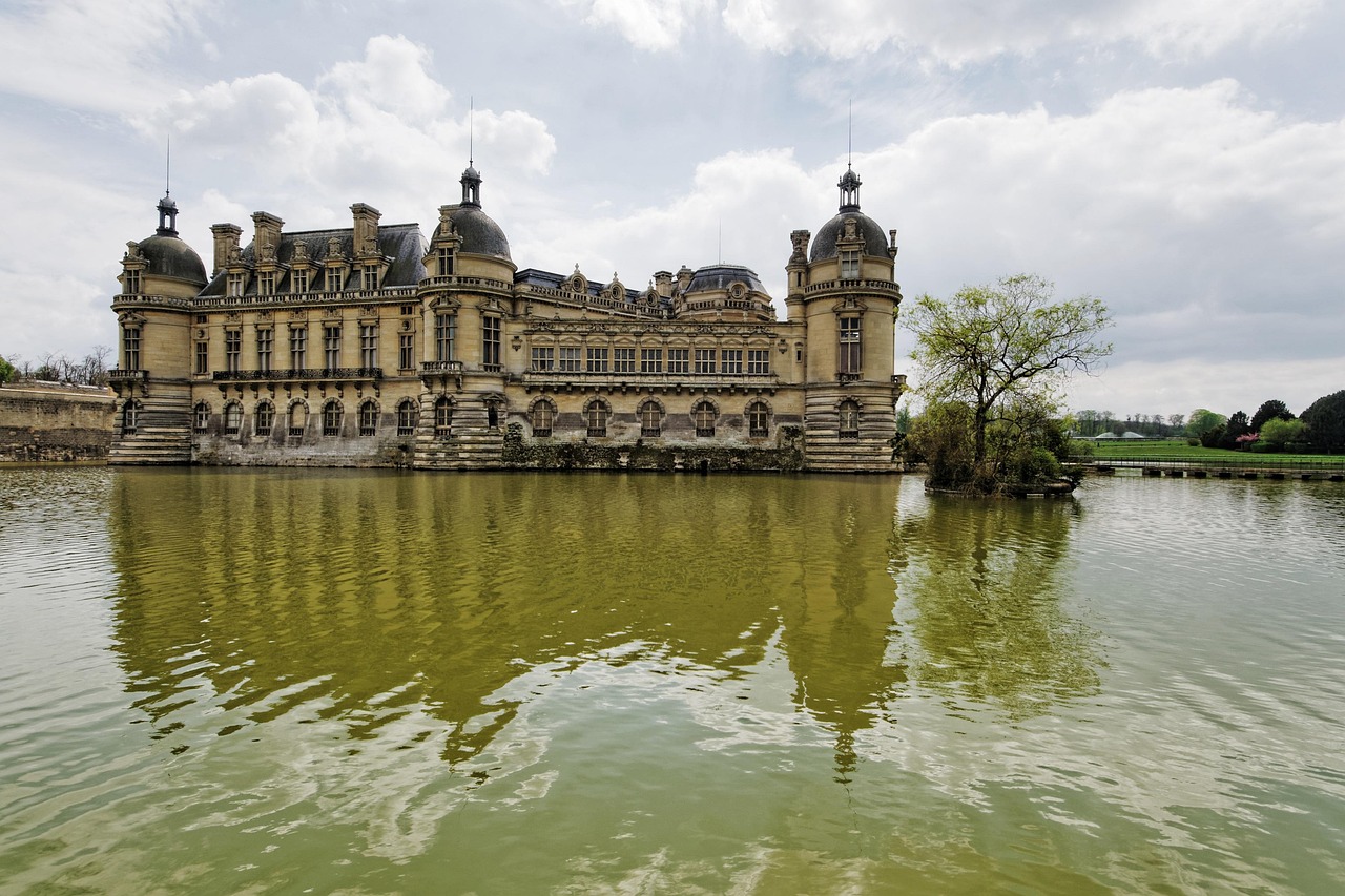 View of Chateau de Chantilly from the formal gardens