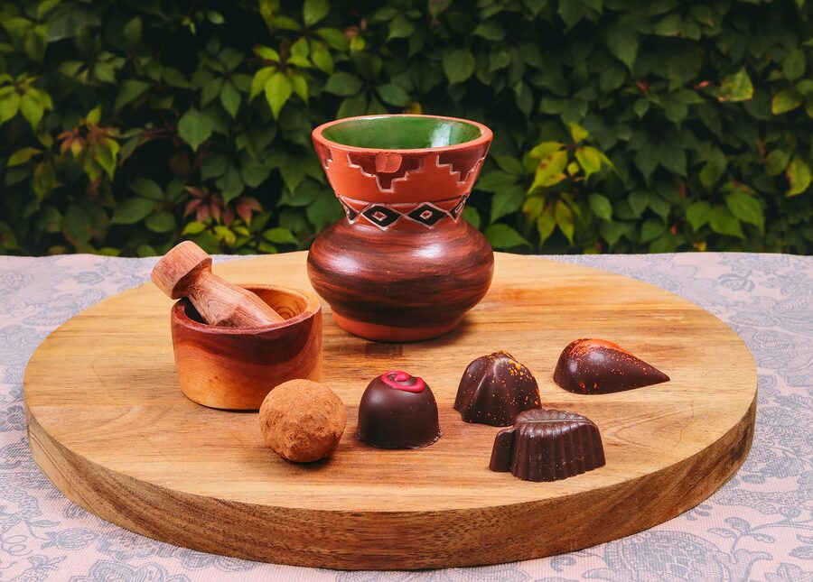 Artisan pralines on rustic wooden board