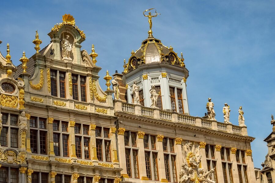 Brussels Grand Place by day with tourists in the square