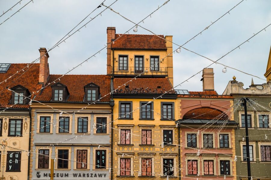 Warsaw Old Town facades lit at evening