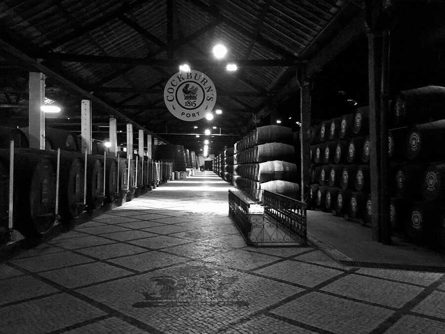 Stacked port wine barrels at Cockburn's lodge in Vila Nova de Gaia