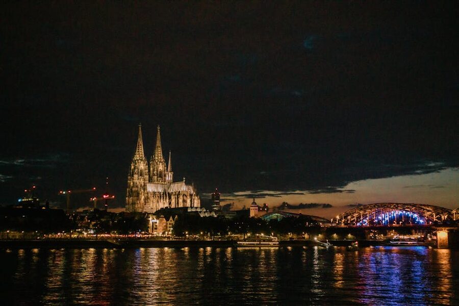 Cologne Cathedral and bridge illuminated at night