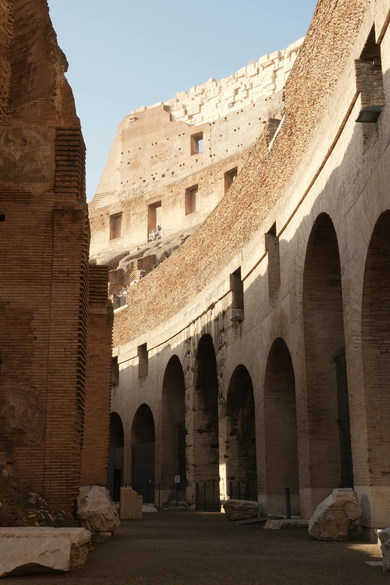 Stone arches and corridors inside the Colosseum in Rome