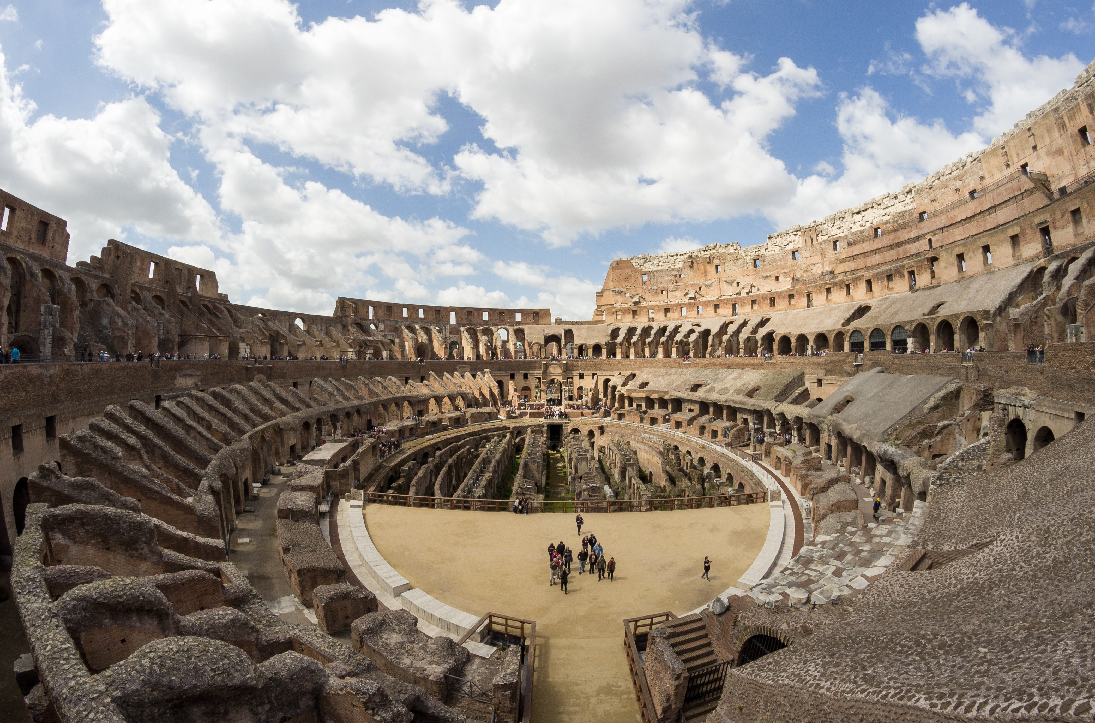Panoramic view inside the Colosseum showing arena floor and underground chambers