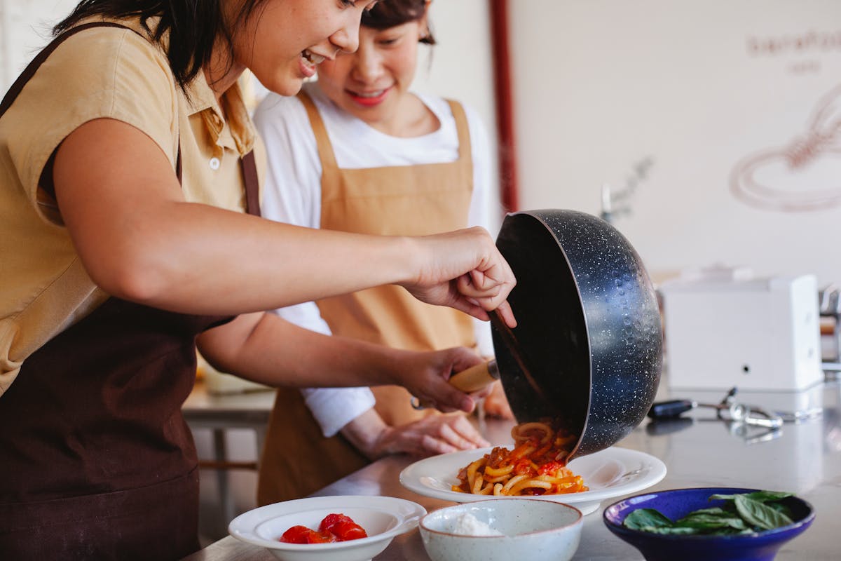 People cooking together during an Italian cooking class