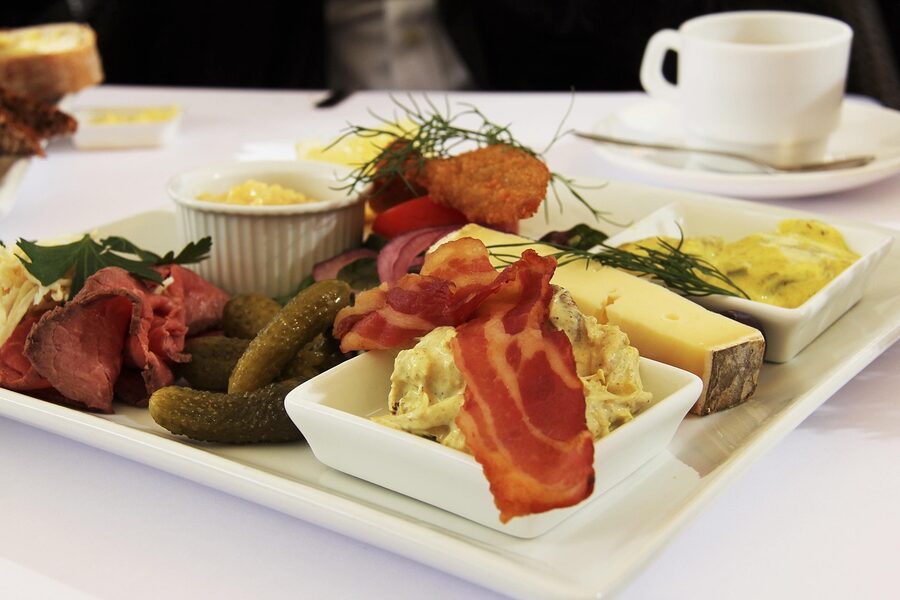 Danish herrings, cheese and rye bread set up in a cafe
