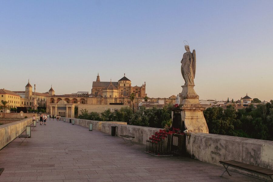 Sunset view of the Roman Bridge in Cordoba with Mosque-Cathedral in background