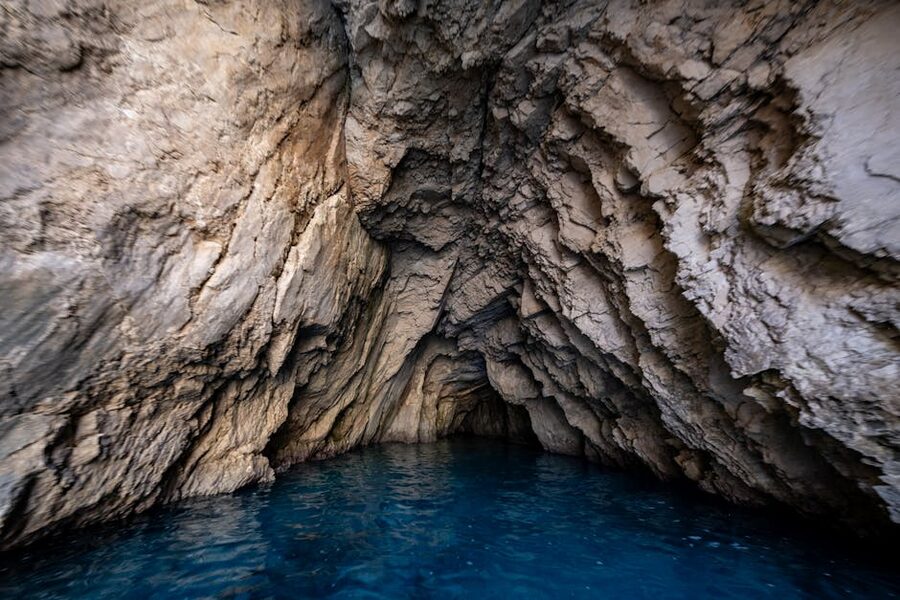 Limestone cave blue water Paxos