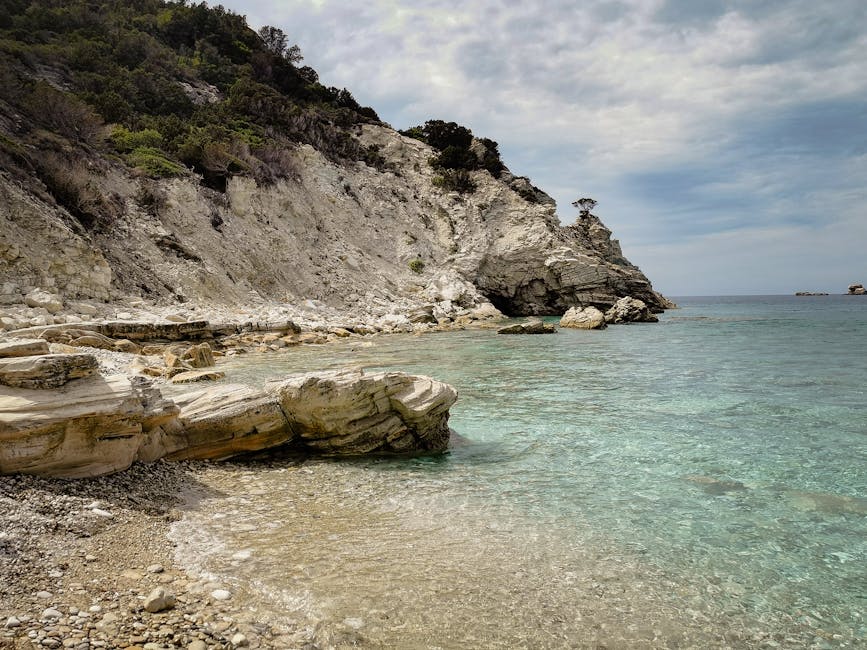 Rocky coastline clear blue waters Antipaxos