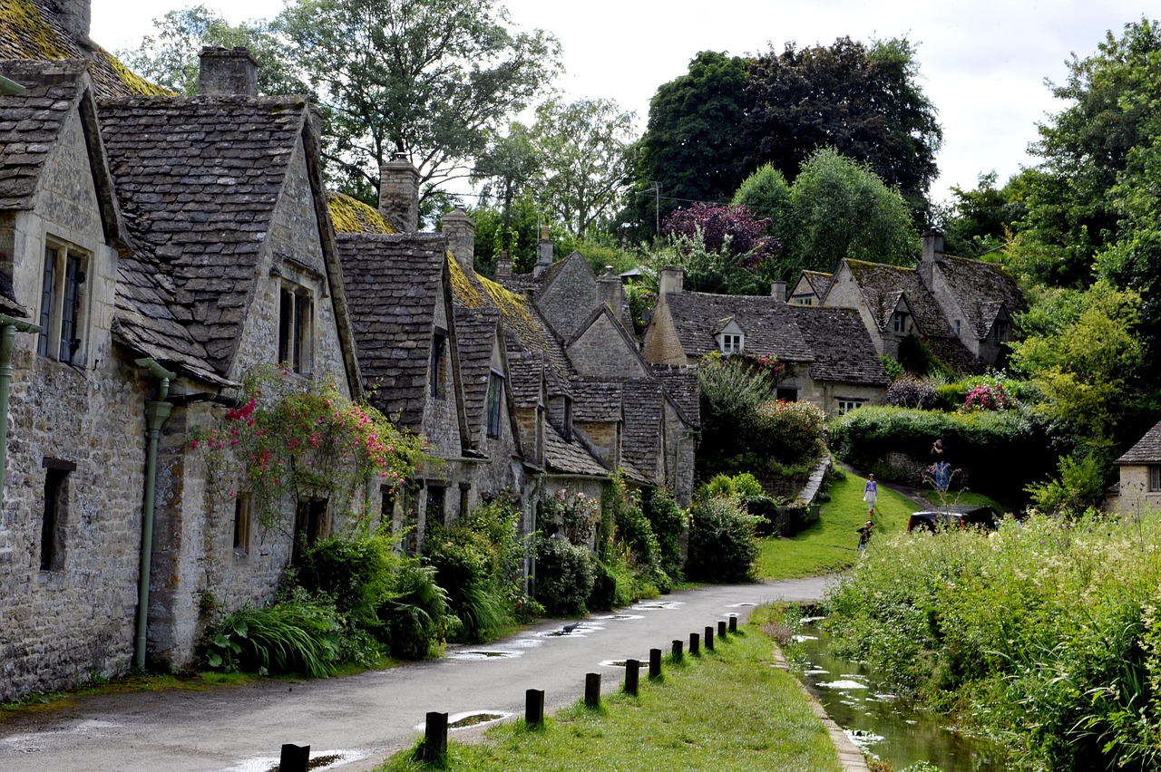 Traditional Cotswolds village surrounded by English countryside