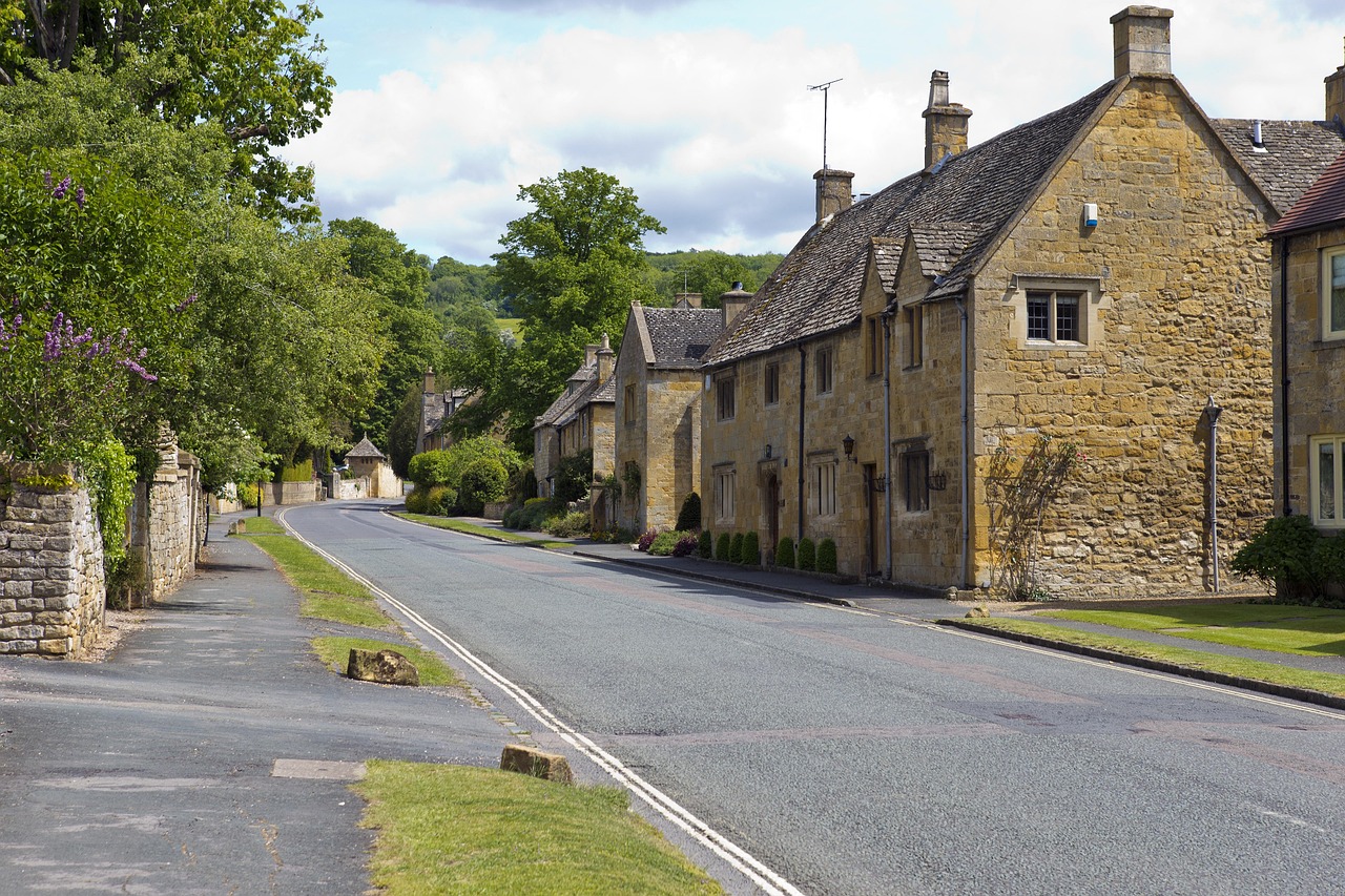 Yellow limestone village street in the Cotswolds