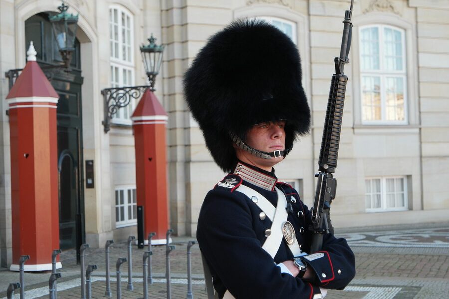 Royal guard in bearskin hat at Amalienborg Castle Copenhagen Denmark