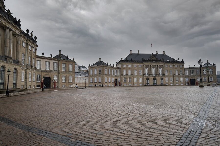 Amalienborg Palace in Copenhagen with overcast skies