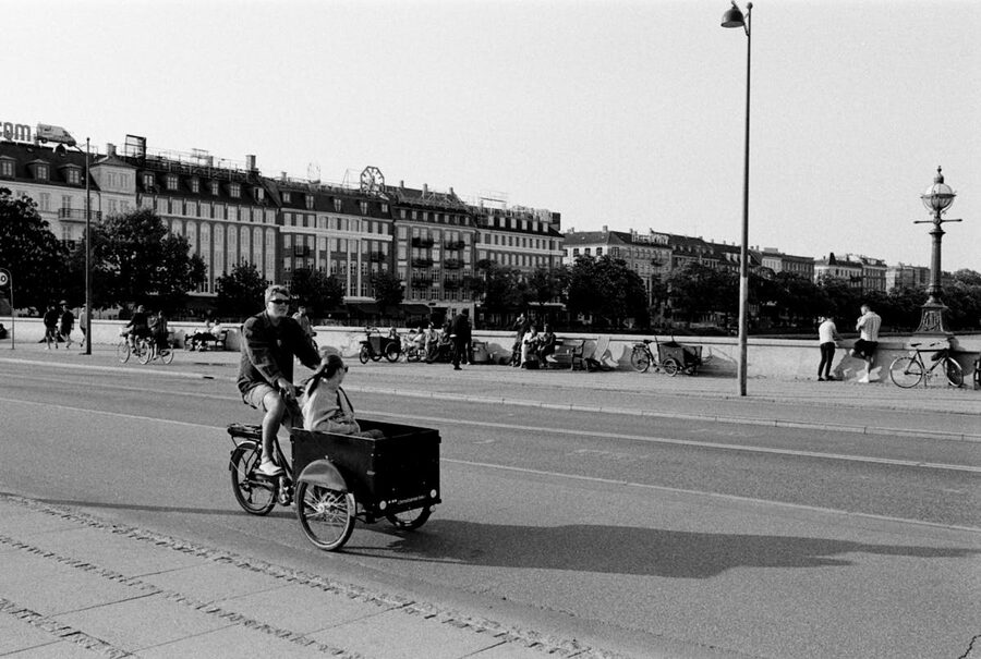 Cyclist on a Copenhagen street in monochrome