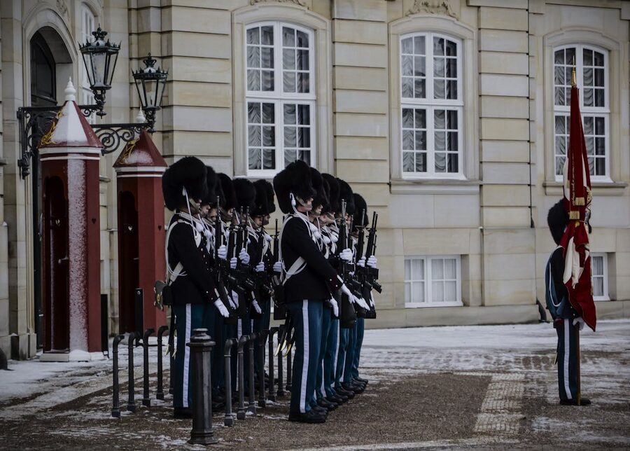 Royal guards in uniforms at Amalienborg Palace Copenhagen Denmark