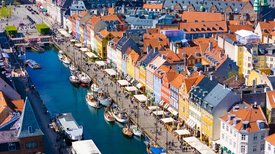 Aerial view of Nyhavn canal and colorful buildings in Copenhagen Denmark